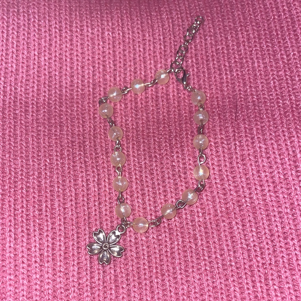 Elegant Silver Bracelet With Floral Charm